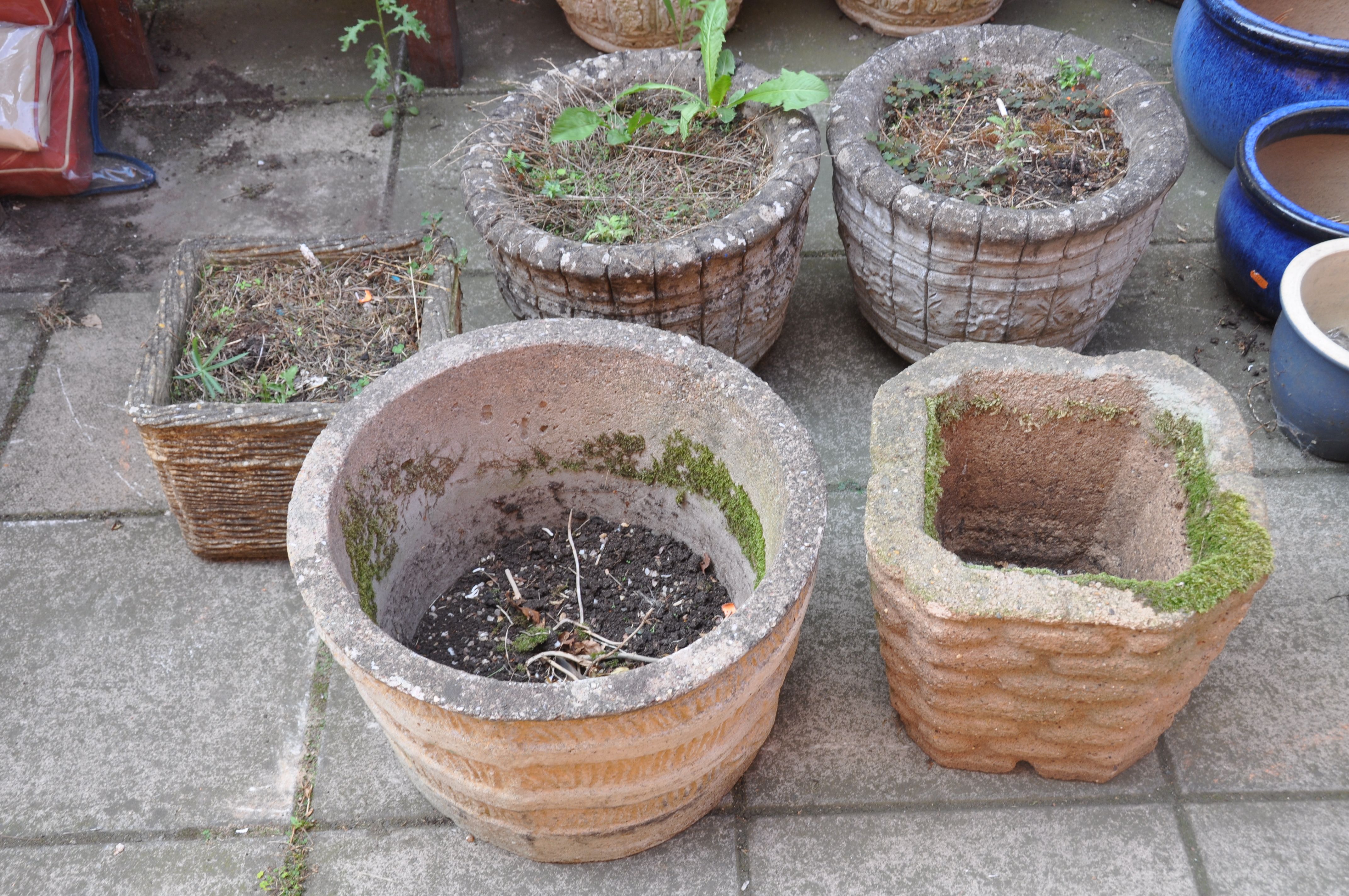 A PAIR OF COMPOSITE GARDEN PLANTERS with barrel effect detailing diameter 38cm height 39cm, and