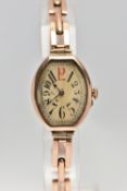 AN EARLY 20TH CENTURY 9CT ROSE GOLD MANUAL WIND WRISTWATCH, the cream dial with black and red Arabic