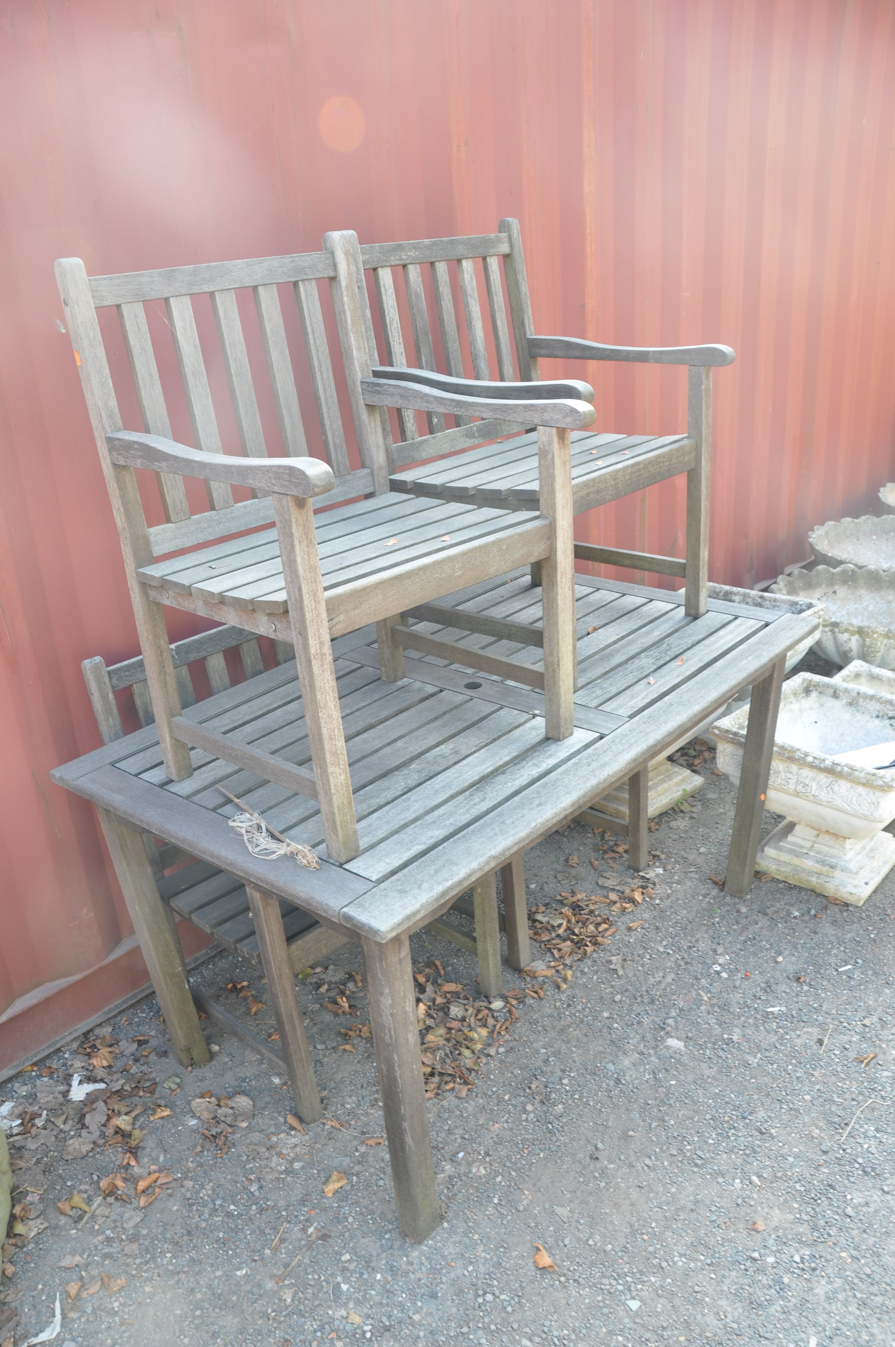 A MODERN HARDWOOD GARDEN TABLE AND FOUR CARVER CHAIRS table width 150cm, depth 90cm height 76cm ( - Image 2 of 3