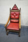 AN OAK THRONE CHAIR, with red leather upholstery, inscribed with gilt 'Elizabeth II Silver Jubilee
