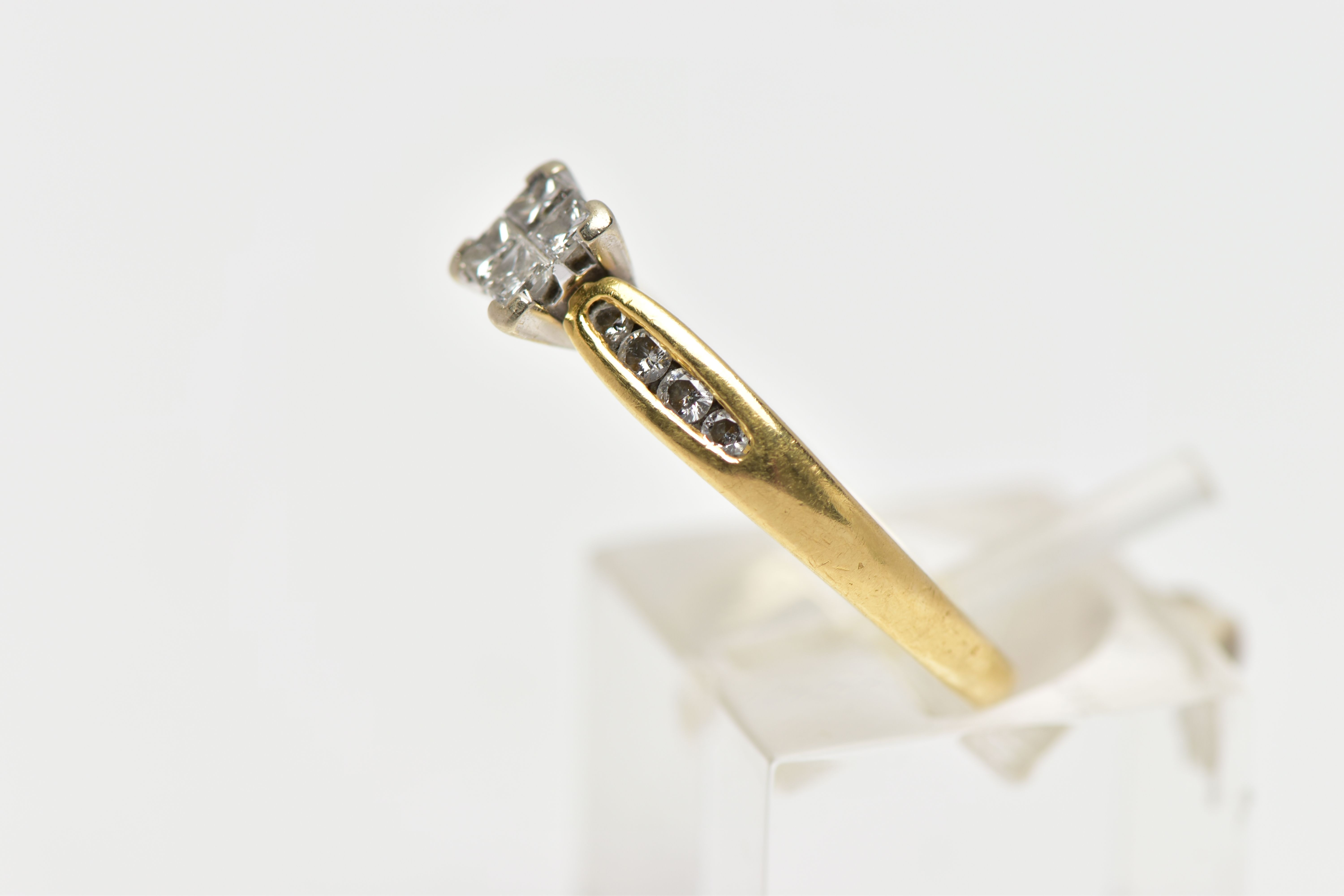 AN 18CT YELLOW GOLD DIAMOND RING, set with a square shape panel of four princess cut diamonds, to - Image 2 of 4