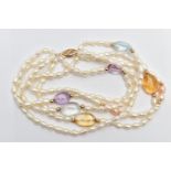 A CULTURED PEARL AND QUARTZ BEAD BRACELET, comprised as a multi strand of cultured pearls, with oval