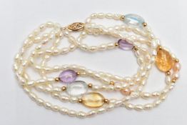 A CULTURED PEARL AND QUARTZ BEAD BRACELET, comprised as a multi strand of cultured pearls, with oval