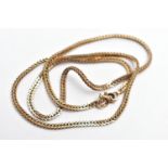 A 9CT GOLD NECKLACE, the chain comprising a series of foxtail links with lobster clasp, import