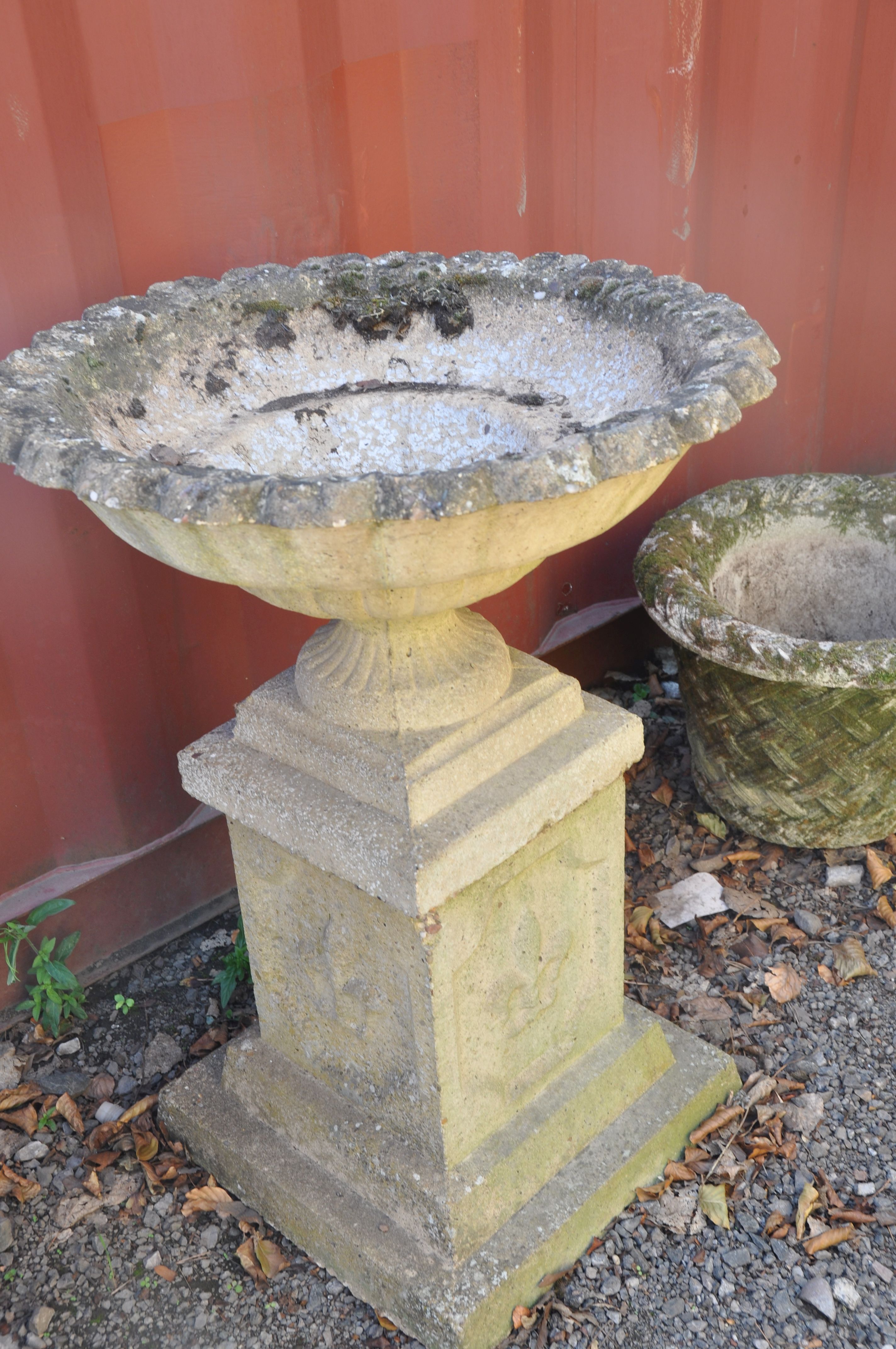 A PAIR OF MODRN COMPOSITE GARDEN URNS on square columns with pie crust top edges, baluster and - Image 2 of 3