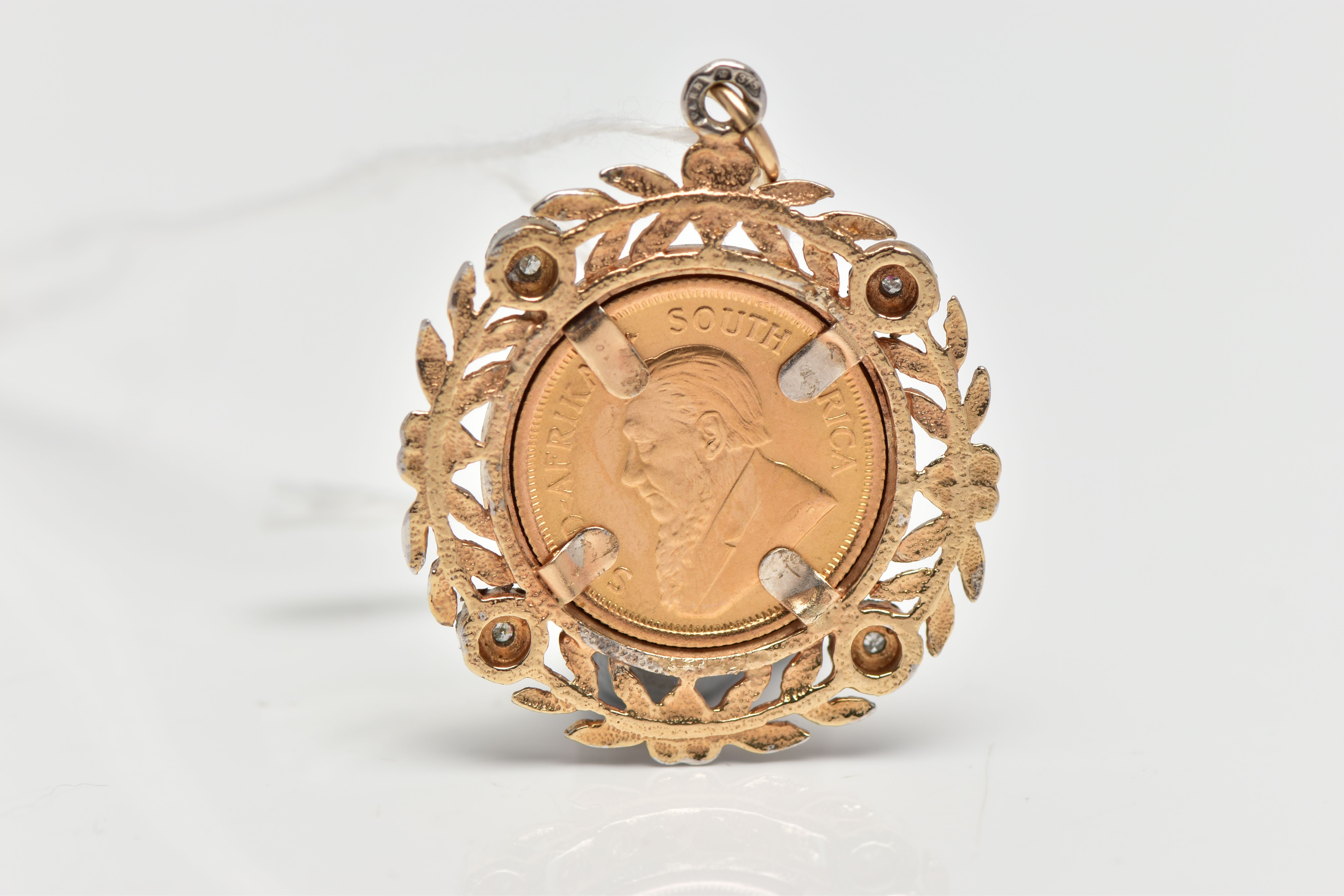 A YELLOW AND WHITE 9CT GOLD DIAMOND SET PENDANT MOUNTED WITH A 1/10 OZ KRUGERRAND, the pendant set - Image 2 of 2