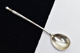 A WHITE METAL CONDIMENT SPOON, the spoon with enamel detail to the reverse, with twist detail handle