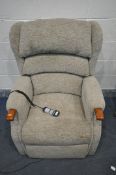 A CELEBRITY OATMEAL RISE AND RECLINE ARMCHAIR (condition - some stains, PAT pass and working)
