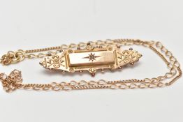 A LATE VICTORIAN 9CT GOLD DIAMOND BROOCH AND A 9CT GOLD NECKLACE, the first designed as a late