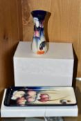 A BOXED MOORCROFT POTTERY WILD CYCLAMEN VASE AND TRAY, each tube lined with Wild Cyclamen pattern on