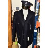 A BOX AND LOOSE PRISON OFFICER UNIFORM AND RELATED ITEMS, to include a JS prison officer's tunic