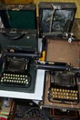 FOUR MANUAL TYPEWRITERS, comprising two Corona models with 1917 patent labels, for spares or