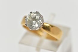 AN 18CT GOLD ZIRCON SINGLE STONE RING, the circular cut white zircon, within a raised crown setting,
