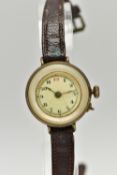 AN EARLY 20TH CENTURY MANUAL WINDING WRISTWATCH, the white enamel dial, with hourly applied Roman