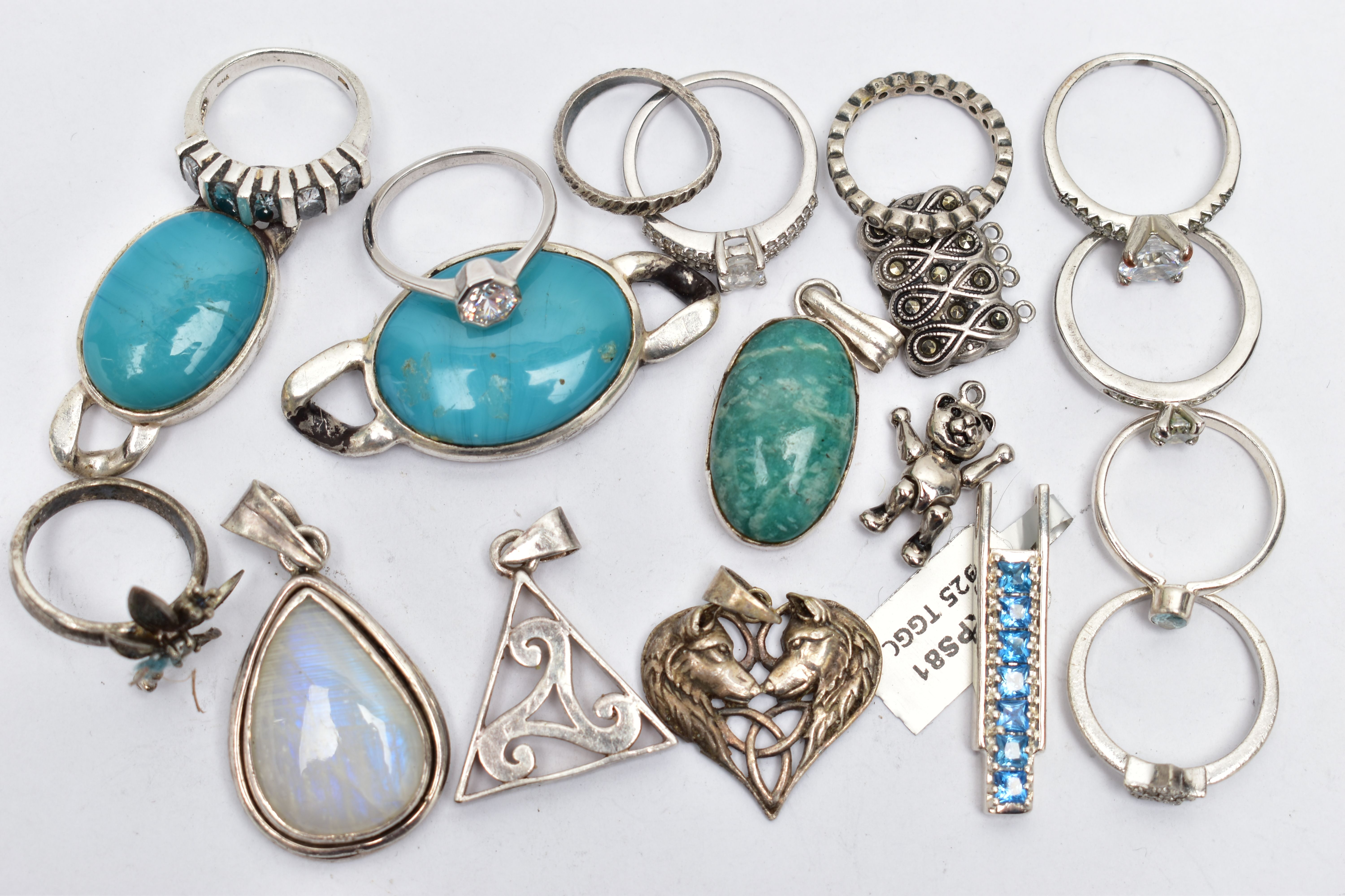 AN ASSORTMENT OF WHITE METAL JEWELLERY, to include a selection of white metal rings, some stamped