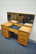JOHN AND SYLVIA REID FOR STAG, A MID CENTURY TEAK 'C RANGE' DRESSING TABLE, with a rectangular
