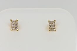 A PAIR OF 18CT GOLD DIAMOND STUD EARRINGS, of rectangular outline, each stud earring pave set with