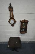 AN OAK CASED ANEROID BAROMETER, inscribed Bailey to dial, height 80cm, an oak case wall clock, and a