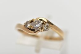 A 9CT GOLD DIAMOND THREE STONE RING, comprising three graduated brilliant cut diamonds, to the