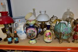 A GROUP OF CERAMICS AND OIL LAMPS, comprising a large Wong Lee WL porcelain vase decorated with