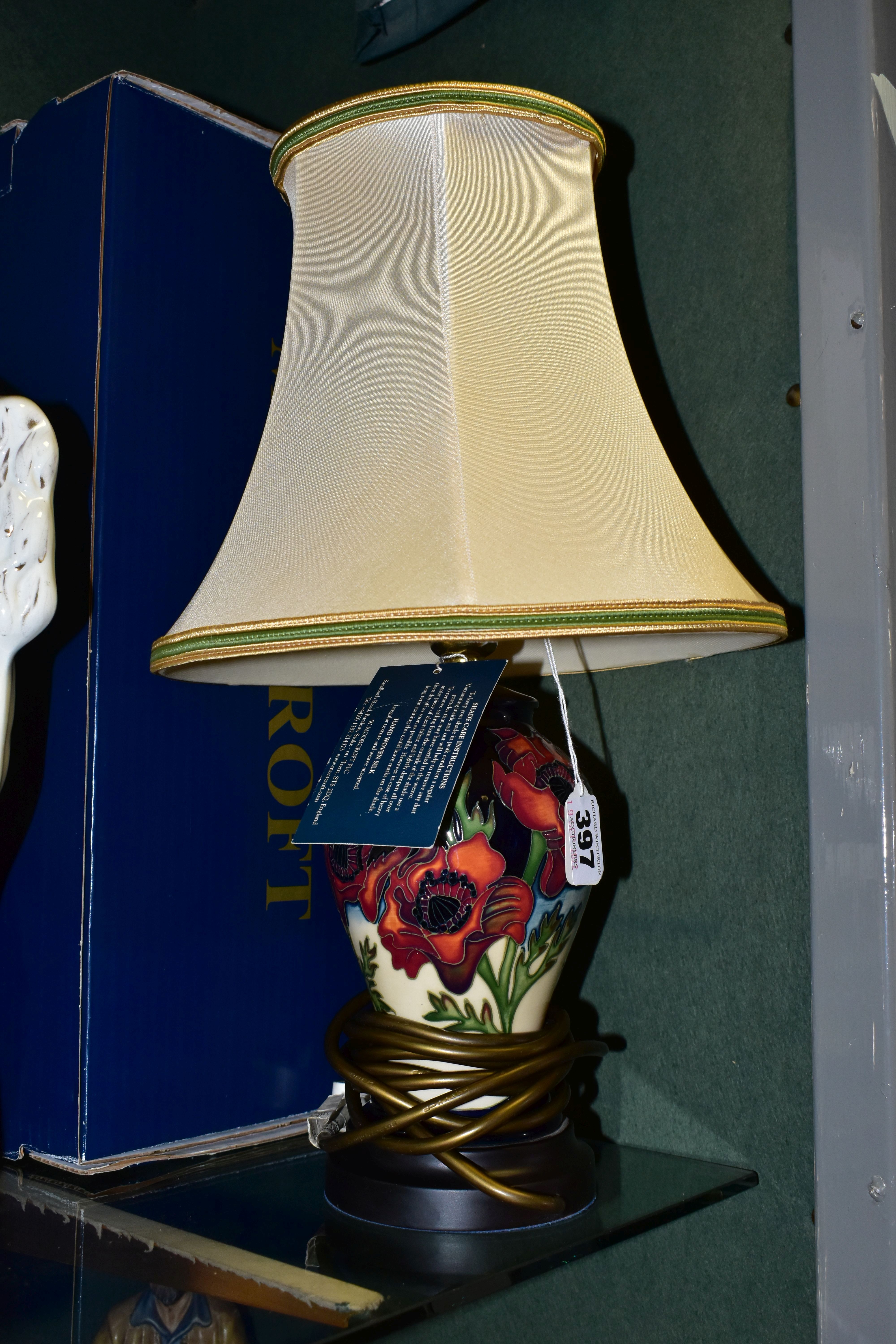 A BOXED MOORCROFT POTTERY FREEDOM FIELDS TABLE LAMP, of baluster form, tube lined with red poppies