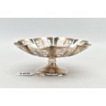 AN EARLY 20TH CENTURY SILVER TAZZA, open work scrolling design, scalloped edge, short stem leading