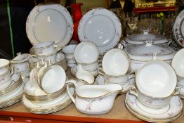 A SEVENTY PIECE WEDGWOOD 'CARISROOKE' PATTERN DINNER SERVICE, comprising two covered tureens,