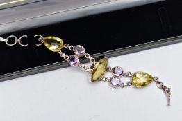 A SILVER GREENISH YELLOW AND AMETHYST BRACELET, the bracelet, comprising variously cut greenish