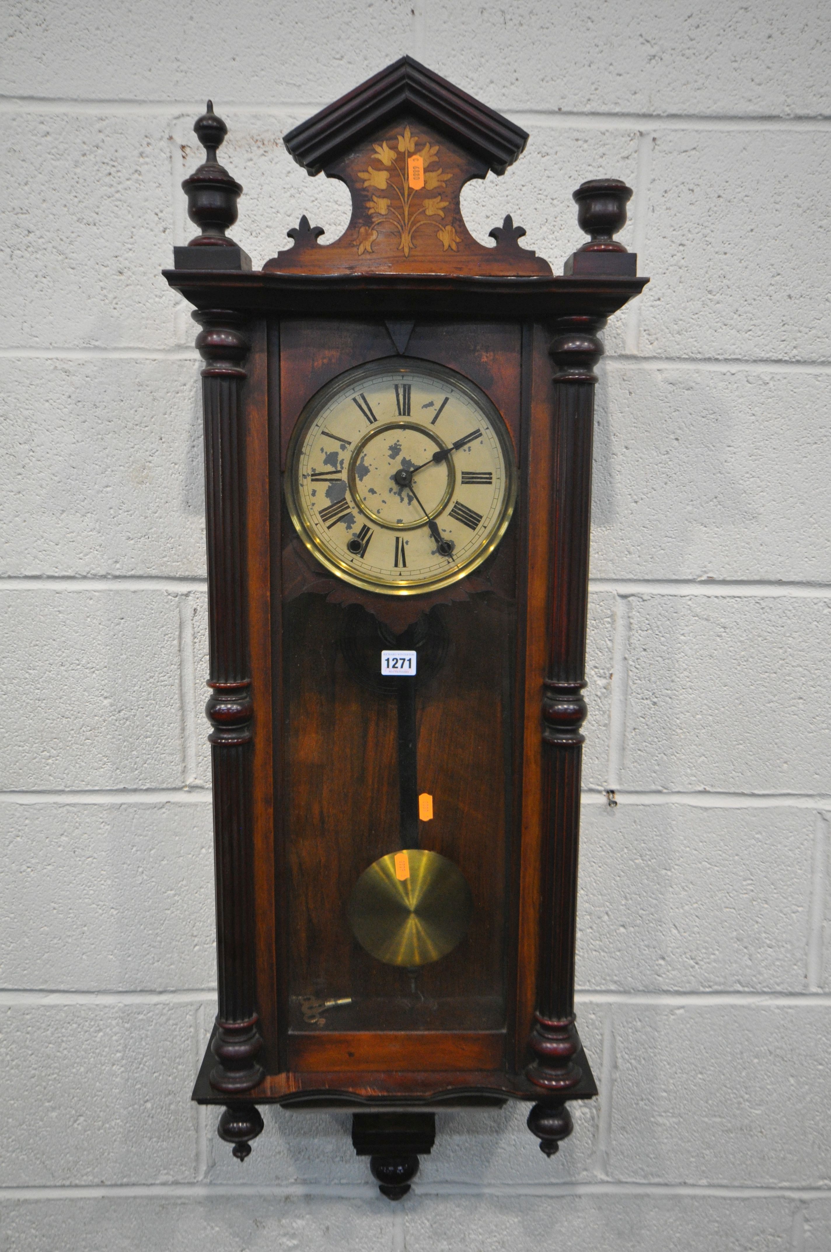 A 19TH CENTURY WALNUT AND INLAID VIENNA WALL CLOCK, height 112cm, with winding key and pendulum (