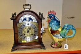 A HERMLE MOON PHASE MANTEL CLOCK TOGETHER WITH A GEORGES DREYFUS FAIENCE COCKEREL JUG, the jug is