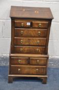 A REPRODUX MAHOGANY MINIATURE CHEST OF EIGHT VARIOUS DRAWERS, width 43cm x depth 31cm x height