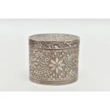 A WHITE METAL TRINKET BOX, of oval form, engraved with floral detailing, detachable lid, approximate