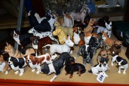 A GROUP OF RESIN DOG FIGURES AND OTHER ANIMALS, approximately thirty figures to include A Breed
