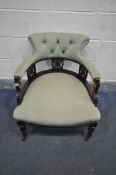 AN EDWARDIAN MAHOGANY TUB CHAIR, with scrolled back, and turned legs (condition - slight wobble to