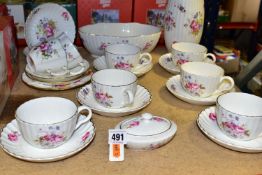 A GROUP OF COALPORT 'SHREWSBURY' PATTERN CHINA, comprising six tea cups, six saucers, two small