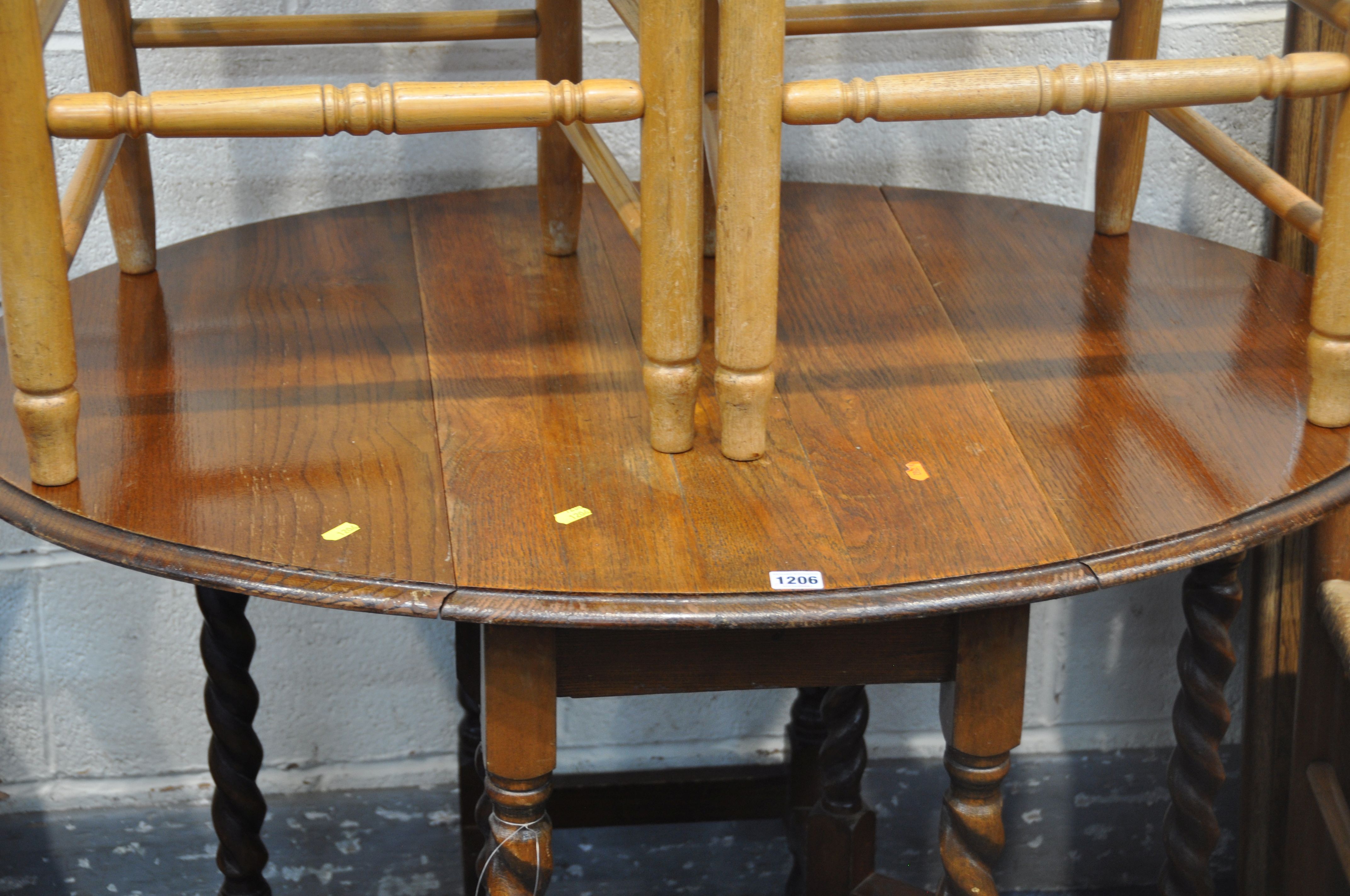 A DISMANTLED OAK TABLE (missing nuts for the legs) a 20th century oak gate leg table, with barley - Image 3 of 4