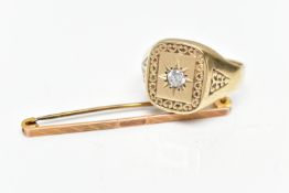 TWO ITEMS OF 9CT GOLD JEWELLERY, the first a signet ring star set with a circular cut paste, to