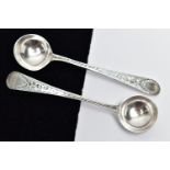 TWO LATE GEORGIAN SILVER SALT SPOONS, each of similar design, with textured pattern handles, to