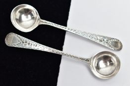 TWO LATE GEORGIAN SILVER SALT SPOONS, each of similar design, with textured pattern handles, to