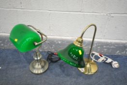 A BANKERS LAMP with a domed glass shade, and another bankers lamp with a circular glass shade (
