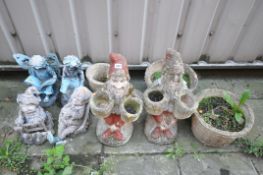 A SELECTION OF GARDEN FIGURES, to include two gnomes, two fairy figures and two other figures, along