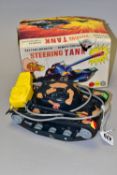 A BOXED MARX TOYS STEERING TANK, remote controlled, battery operated, in playworn condition, with