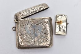 A SILVER VESTA AND WHITE METAL LIGHTER, foliage engraving and monogram engrave cartouche, hinged
