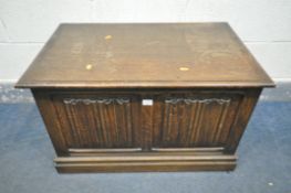 AN OAK LINENFOLD BLANKET CHEST, width 81cm x depth 51cm x height 51cm (condition:-lid with surface