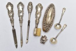 AN ASSORTMENT OF SILVER AND WHITE METAL ITEMS, to include a three part silver handled manicure