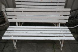 A PAIR OF PAINTED METAL AND TEAK SLATTED BENCHES, length 141cm