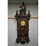 A LATE 19TH CENTURY REGULATOR VIENNA WALL CLOCK, having a resin horse finial, the door with