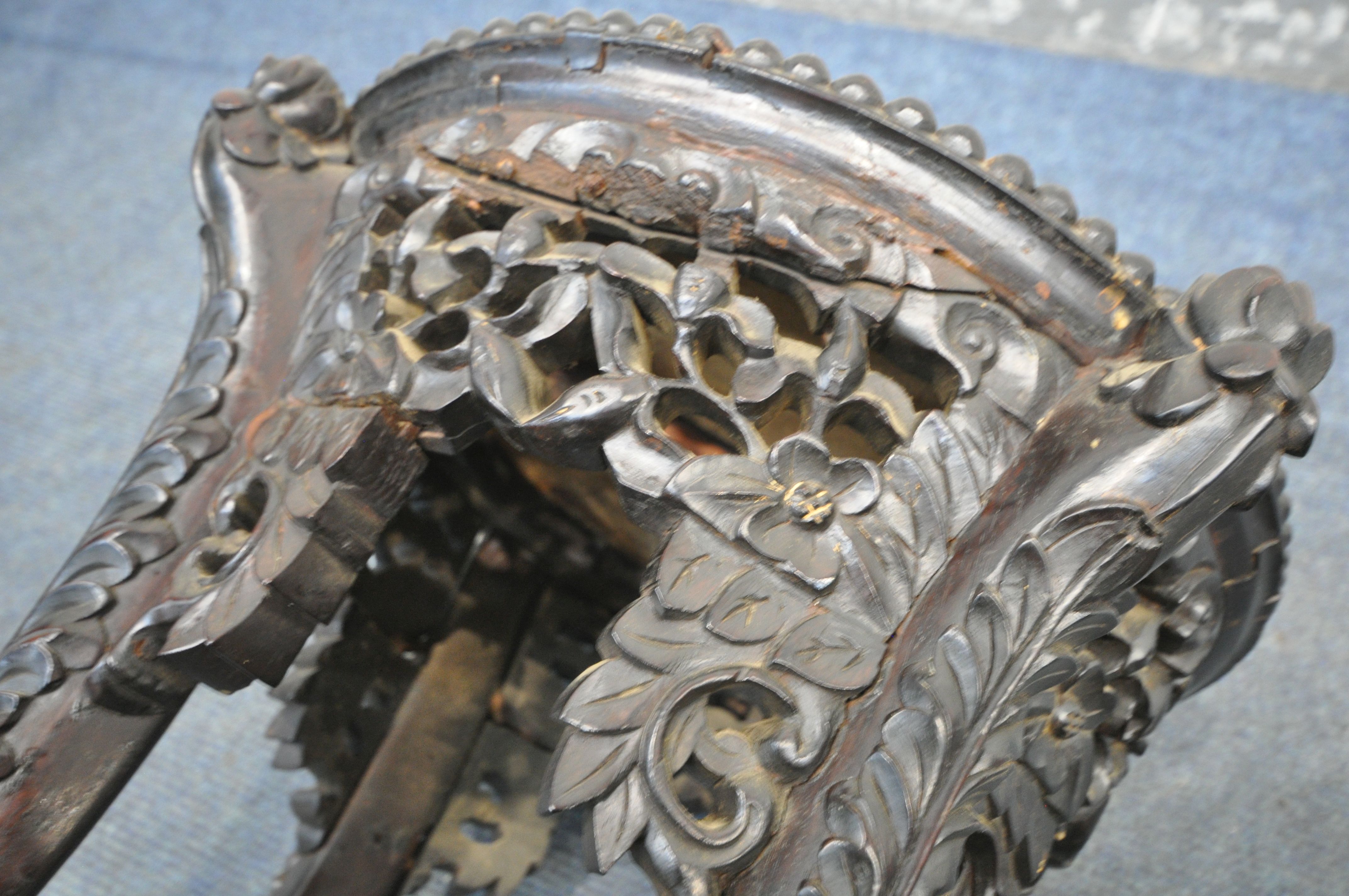 AN INTRICATLY CARVED CIRCULAR CHINESE ROSEWOOD SIDE TABLE, with a veined marble insert, the four - Image 8 of 8