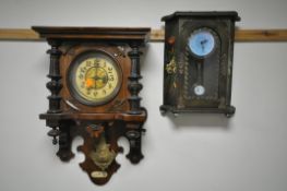 AN EARLY 20TH CENTURY GERMAN WALL CLOCK, with half turned pillar flanking a circular panel glazed