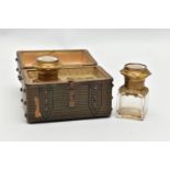 A LATE 19TH CENTURY GREEN LEATHER AND BRASS STUDDED CASKET CONTAINING A PAIR OF PERFUME BOTTLES, the